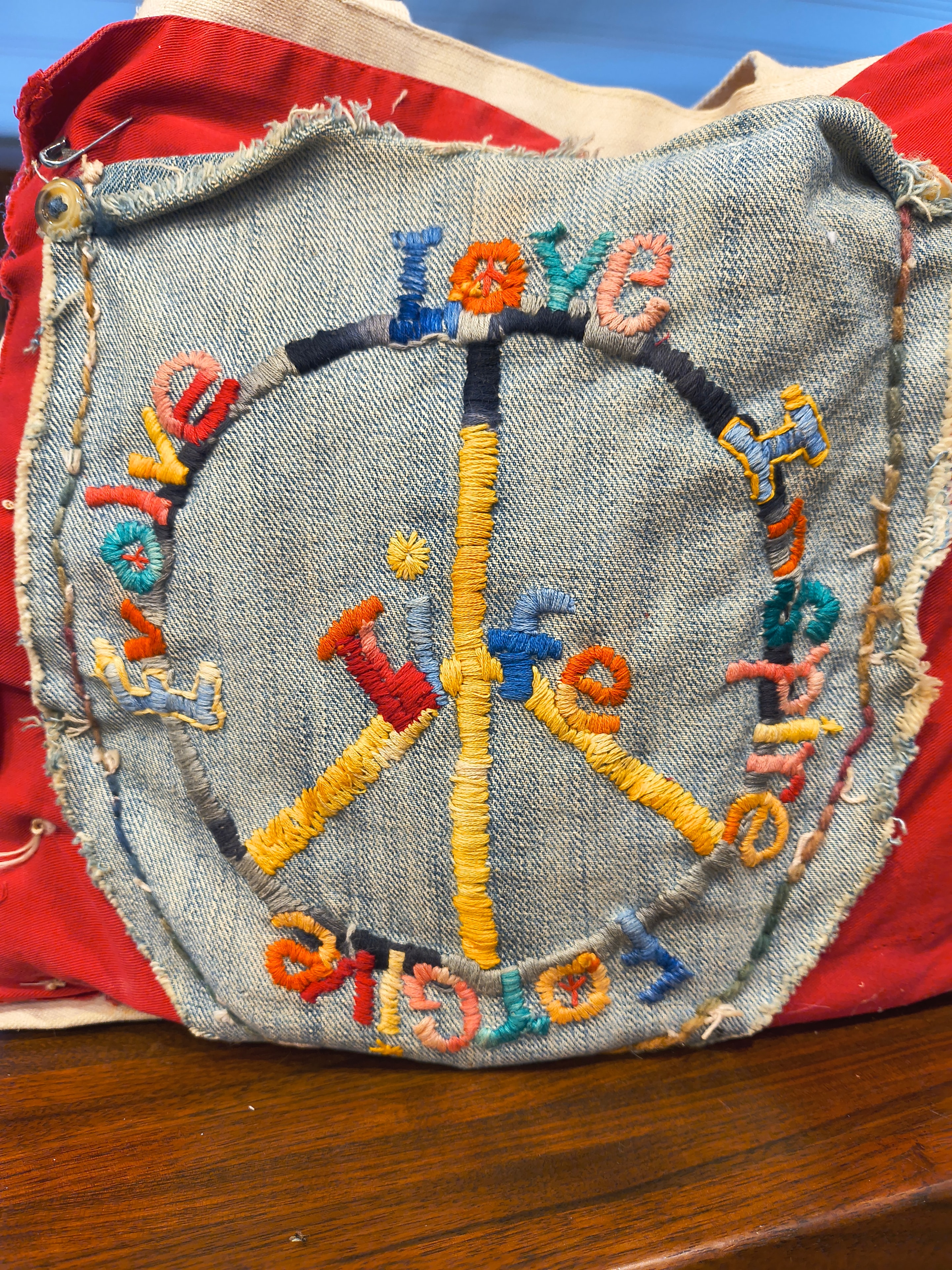 Colorful embroidered handmade Sista Dreads piece